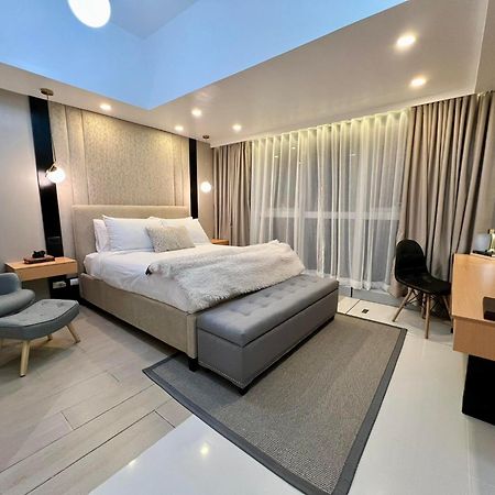 Hotel Vibe Condo At Uptown Parksuites Bgc Тагіг Екстер'єр фото